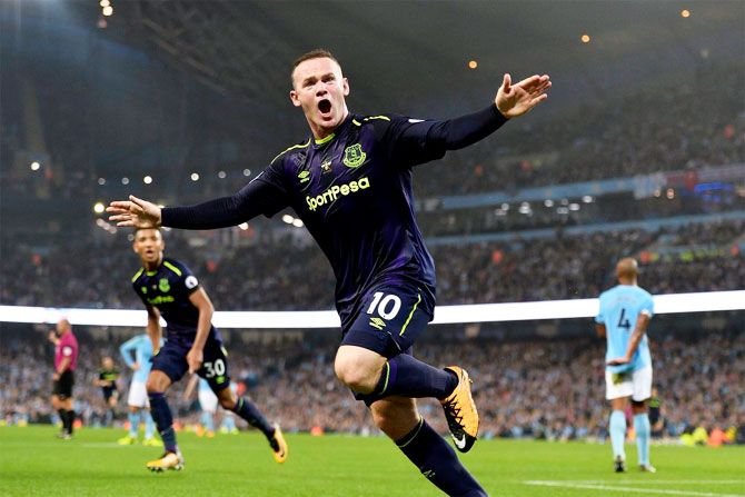 Everton's Wayne Rooney celebrates on scoring his 200th EPL goal against Manchester City 