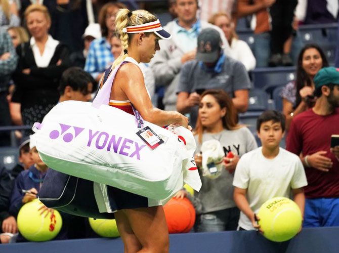 Germany's Angelique Kerber leaves the court after losing to Japan's Naomi Osaka at Ashe Stadium on day two of the US Open at the USTA Billie Jean King National Tennis Center on Tuesday