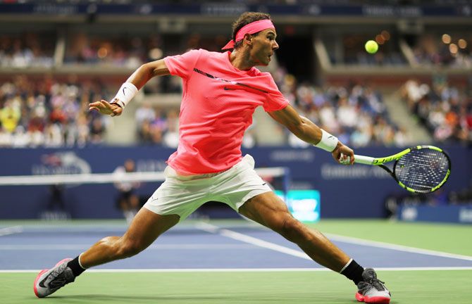 Spain's Rafael Nadal returns a shot to Serbia's Dusan Lajovic during their first round match on Day 2 of the 2017 US Open at the USTA Billie Jean King National Tennis Center in the Flushing neighborhood of the Queens borough of New York City on Tuesday