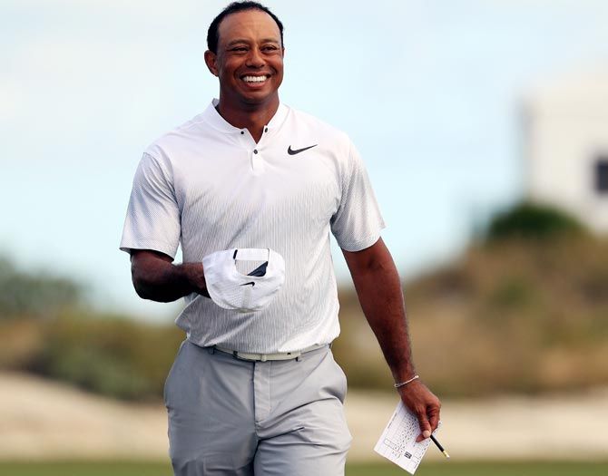 Tiger Woods walks off the 18th green after finishing the second round of the Hero World Challenge, December 2017. Photograph: Mike Ehrmann/Getty Images
