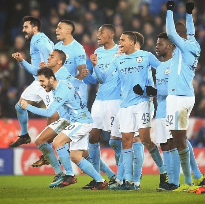 Manchester City players celebrate winning a game. Photograph: Man City/Twitter