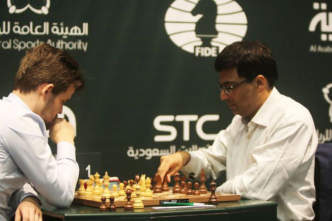 Maguns Carlsen (left) and Viswanathan Anand compete on the Day 3 of the King Salman Rapid & Blitz Chess Championships in Riyadh, Saudi Arabia, on Wednesday