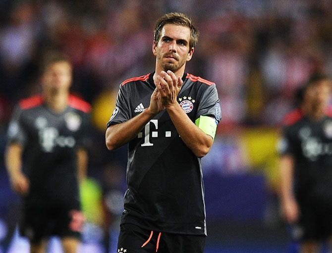 Bayern Munich's Philipp Lahm, who retired from internationals after Germany's World Cup victory in Brazil, came through Bayern's ranks before spending two seasons on loan at VfB Stuttgart between 2003-2005