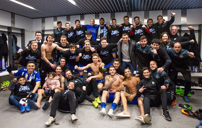 Alaves players celebrate in the dressing room after edging Celta Vigo to reach the King's Cup final, their first in 96 years.