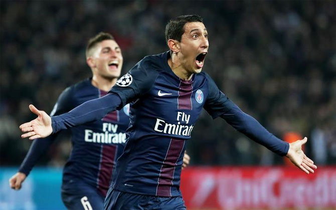 PSG's Angel Di Maria celebrates on scoring the opener against Barcelona during their Champions League last 16 first leg match at the Parc des Princes stadium in Paris on Tuesday