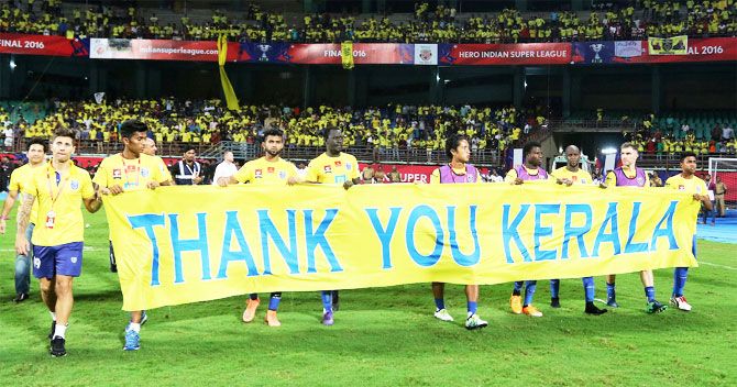Kerala Blasters players hold up a banner after the semi-final. ISL was the most viewed televised sport event of the year in Kerala