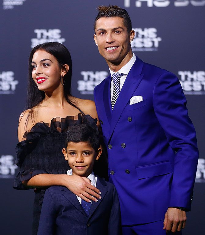 Ronaldo, Cristiano Ronaldo Jr and Georgina Rodriguez arrive at the ceremony. Photograph: Arnd Wiegmann/Reuters