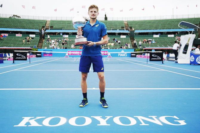 Belgium's David Goffin holds the trophy after defeating Croatia's Ivo Karlovic to win the2017 Priceline Pharmacy Kooyong Classic in Melbourne on Friday