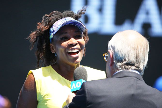 Venus Williams is interviewed after winning her second round match against Stefanie Voegele