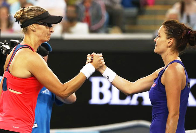 Croatia's Mirjana Lucic-Baroni is congratulted by 3rd seed Poland's Agnieszka Radwanska after winning her second round match on Thursday