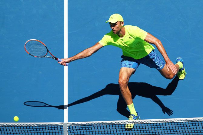 Croatia's Ivo Karlovic plays a forehand in his third round match against Belgium's David Goffin on Monday