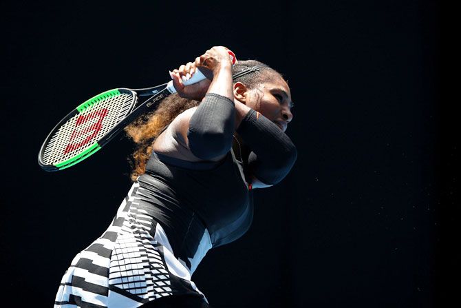 USA's Serena Williams plays a backhand in her fourth round match against the Czech Republic's Barbora Strycova during their 2017 Australian Open fourth round match at Melbourne Park on Monday