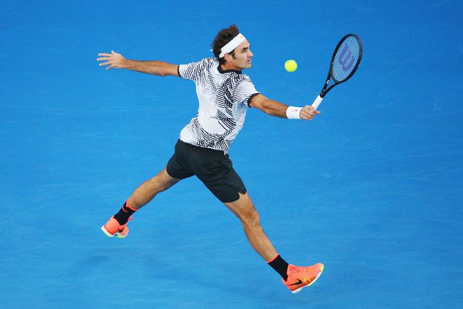 Switzerland's Roger Federer plays a backhand return in his Australian Open quarter-final against Germany's Mischa Zverev on Tuesday