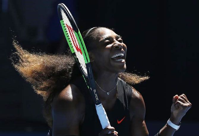 Serena Williams of the US celebrates match point after defeating Britain's Johanna Konta in the Australian Open quarter-final in Melbourne on Wednesday