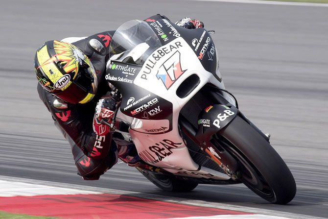 Pull&Bear Aspar Team's Czech rider Karel Abraham rounds the bend during the MotoGP Tests In Sepang at the Sepang Circuit in Kuala Lumpur, Malaysia, on Monday