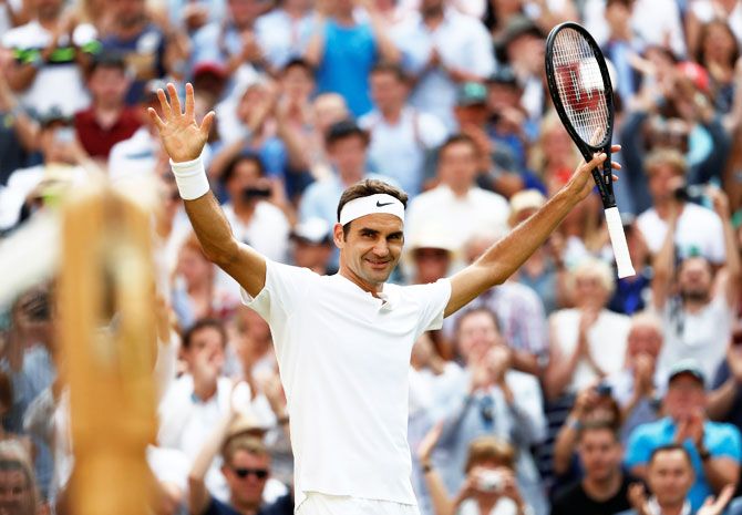 Roger Federer celebrates his fourth round win over Grigor Dimitrov on Monday