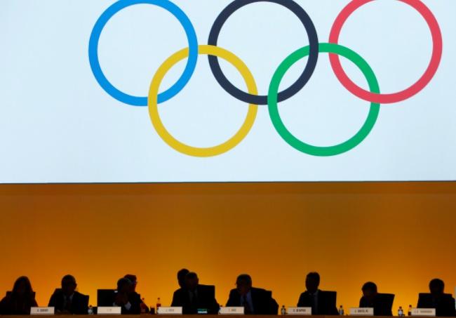  International Olympic Committee (IOC) delegates are seen during the IOC extraordinary session in Lausanne