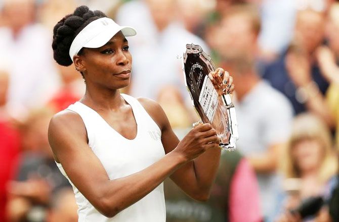 Venus Williams with the Wimbledon runner-up trophy after losing the final on Saturday