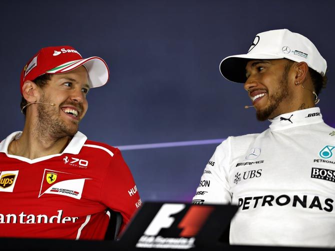 Ferrari's Sebastian Vettel trails leader Mercedes' Lewis Hamilton by 17 points in the championship table