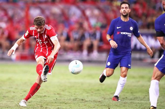 Bayern Munich’s Thomas Muller scores the third goal against Chelsea during their International Champions Cup in Singapore on Tuesday
