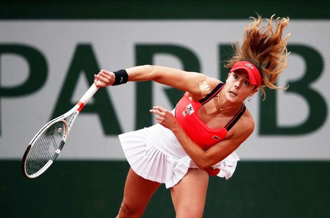France's Alize Cornet in action during her third round match against Poland's Agnieszka Radwanska