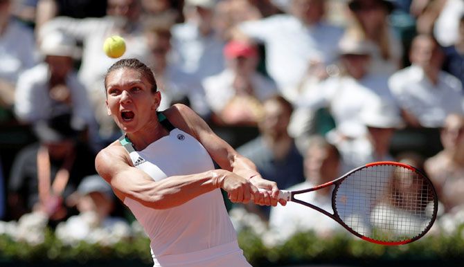 Simona Halep in action against Jelena Ostapenko in the French Open women's final at Roland Garros in Paris on Saturday