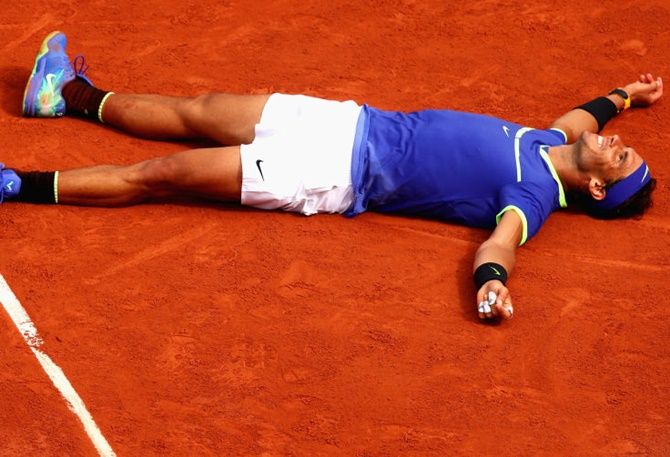 Rafael Nadal of Spain celebrates victory following the men’s singles final against Stanislas Wawrinka of Switzerland