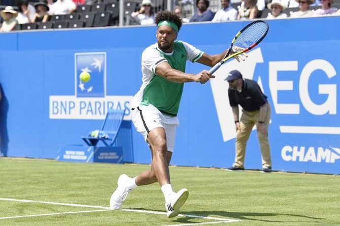 France's Jo-Wilfried Tsonga in action during his first round match against compatriot Adrian Mannarino