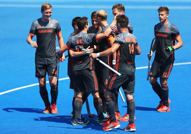 Sander Baart of the Netherlands celebrates with teammates as he scores their second goal during the Pool B match against India on Day 6 of the Hero Hockey World League Semi-Final at Lee Valley Hockey and Tennis Centre in London on Tuesday