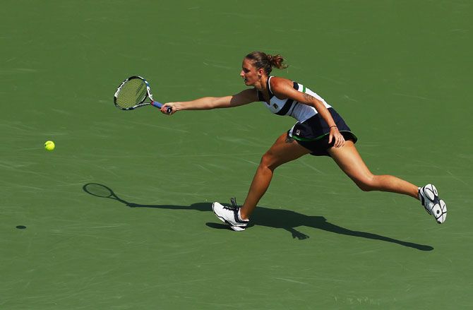 Czech Republic's Karolina Pliskova returns a shot against USA's Madison Brengle during Day 4 of the Miami Open at Crandon Park Tennis Center in Key Biscayne, Florida, on Thursday