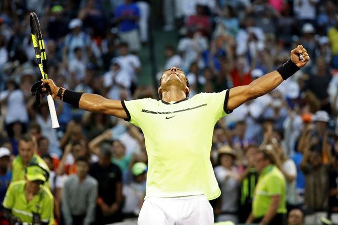 Spain’s Rafael Nadal celebrates after winning his match against Germany’s Philip Kohlschreiber on day six of the 2017 Miami Open at Crandon Park Tennis Center in Miami, Key Biscayne, Florida, on Sunday, March 26.