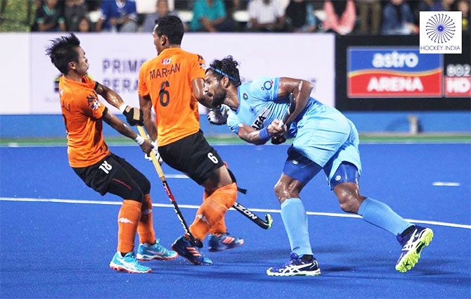 India's Rupinderpal Singh in action during the match against Malaysia during their Azlan Shah match at Ipoh, Malaysia, on Friday