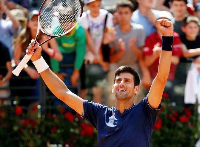 Djokovic reacts after defeating Juan Martin Del Potro in the Rome Open on Saturday