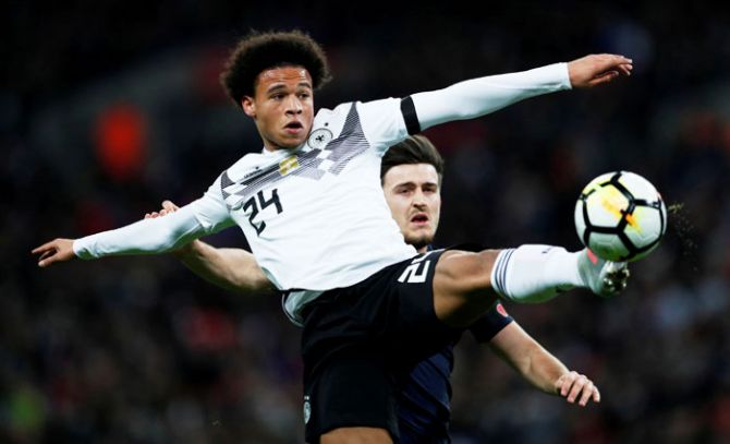 Germany's Leroy Sane in action with England's Harry Maguire during their international friendly on Friday