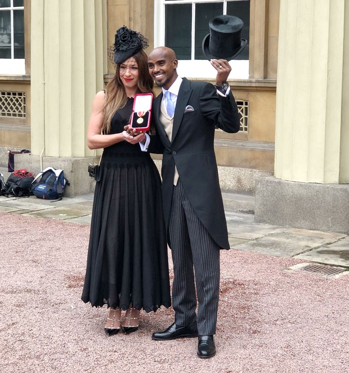 Sir Mo Farah and his wife Tania Nell show off the medal