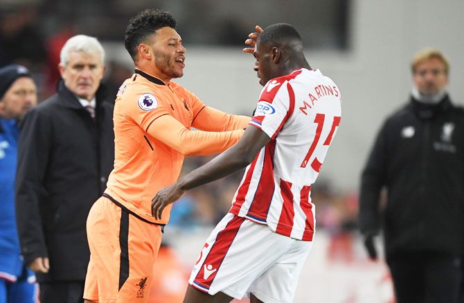 Liverpool's Alex Oxlade-Chamberlain and Stoke City's Bruno Martins Indi get into a scuffle