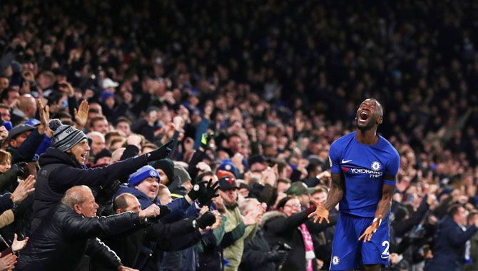 Chelsea's Antonio Rudiger celebrates on scoring against Swansea City at Stamford Bridge in London