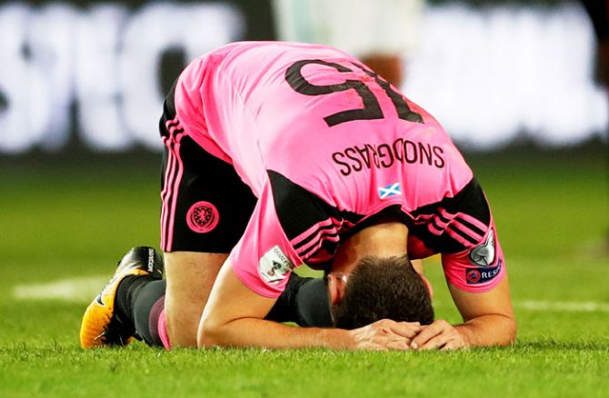 Scotland’s Robert Snodgrass looks dejected after the match against Slovenia