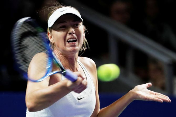 Russia's Maria Sharapova in action against Slovakia's Magdalena Rybarikova during the first round match of the Kremlin Cup in Moscow, Russia on Tuesday