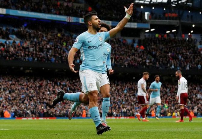 Manchester City's Sergio Aguero celebrates scoring their first goal against Burnley during their English Premier League match at Etihad Stadium in Manchester on Saturday