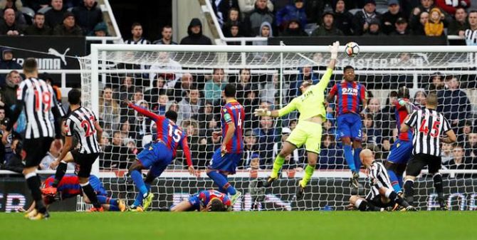 Newcastle United's Mikel Merino scores their first goal against Crystal Palace during their English Premier League match at St James's Park in Newcastle on Saturday
