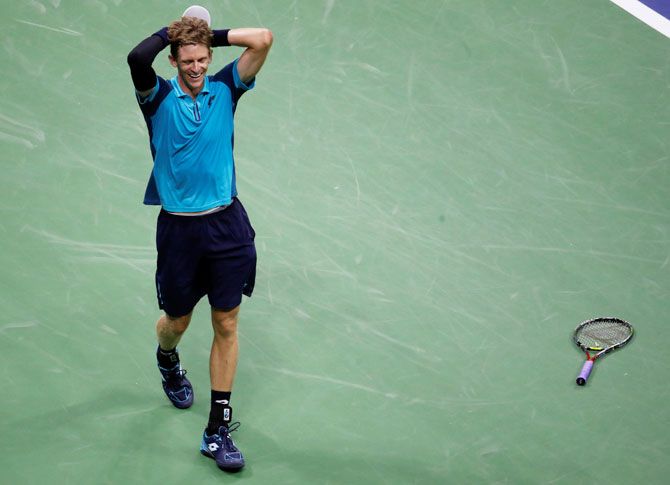 South Africa's Kevin Anderson celebrates his win against Spain's Pablo Carreno Busta