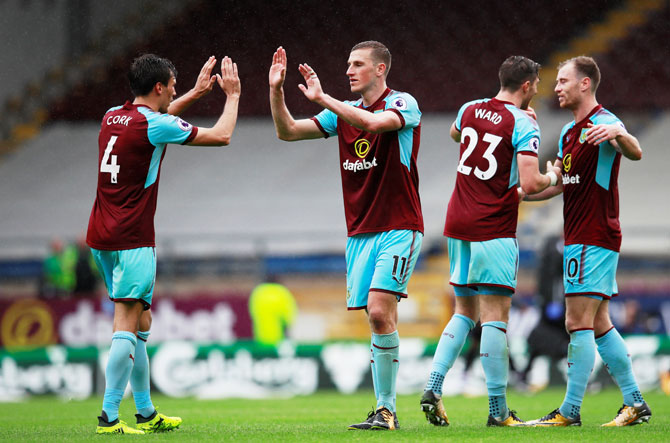 Burnley’s Chris Wood celebrates with Jack Cork after the match against Crystal Palace in Burnley on Sunday