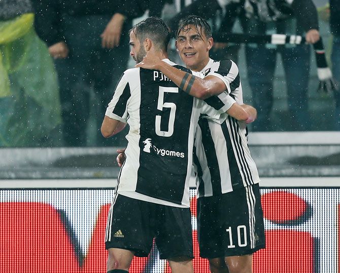 Paulo Dybala of Juventus FC celebrates after scoring a goal during their Serie A match against AC Chievo Verona in Turin, Italy, on Saturday
