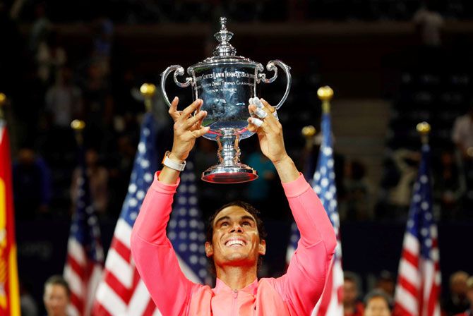 Rafael Nadal holds the trophy aloft after winning the US Open in New York on Sunday