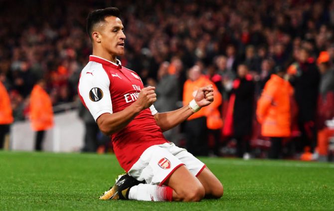 Arsenal's Alexis Sanchez celebrates scoring the 2nd during the UEFA Europa League Group H match against 1. FC Koeln at Emirates Stadium in London on Thursday