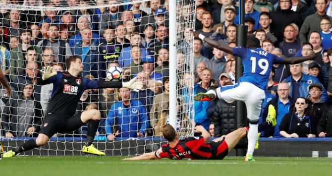 Everton's Oumar Niasse scores their first goal past Bournemouth's Asmir Begovic during their match at Goodison Park in Liverpool