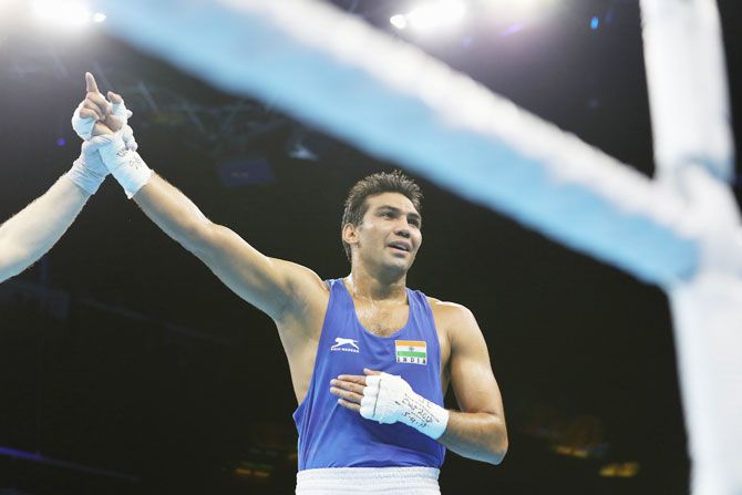 India's Manoj Kumar celebrates after his victory against Nigeria's Osita Umeh on Day 1 of the Gold Coast 2018 Commonwealth Games at Oxenford Studios on the Gold Coast, on Thursday