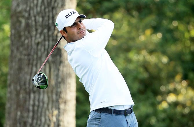 India's Shubhankar Sharma plays his shot from the second tee during the second round of the 2018 Masters Tournament at Augusta National Golf Club in Augusta, Georgia, on Friday