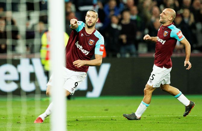 West Ham United's Andy Carroll celebrates scoring their first goal